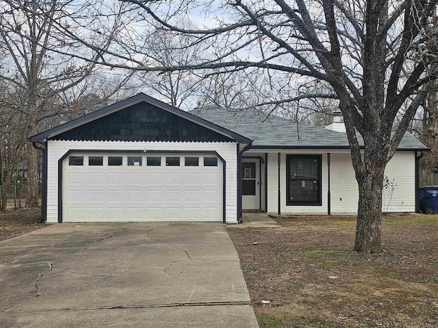 single story home with a garage