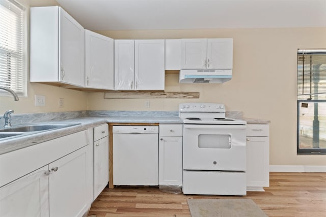 kitchen featuring white cabinetry, white appliances, and light wood-type flooring