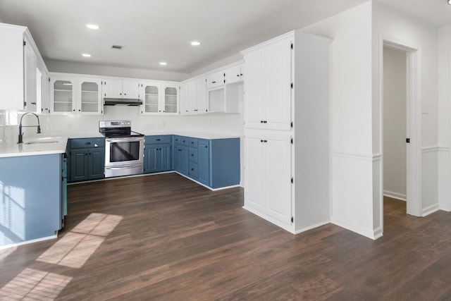 kitchen featuring white cabinets, dark hardwood / wood-style floors, sink, and electric range