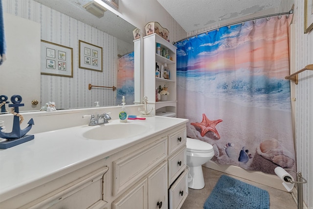 full bathroom with vanity, toilet, a textured ceiling, and shower / bath combo with shower curtain