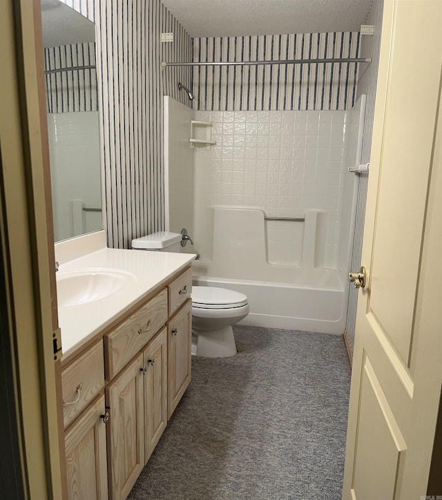 full bathroom featuring shower / bathtub combination, vanity, and toilet