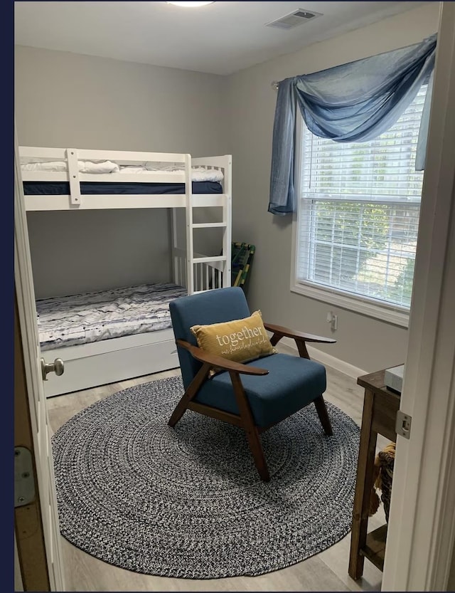 bedroom featuring hardwood / wood-style flooring