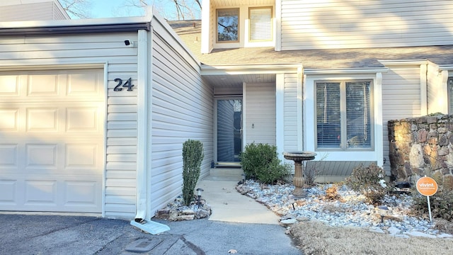 property entrance featuring a garage