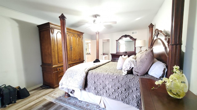 bedroom featuring light hardwood / wood-style floors and ceiling fan