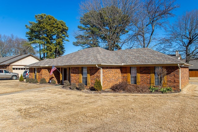 ranch-style home with a garage