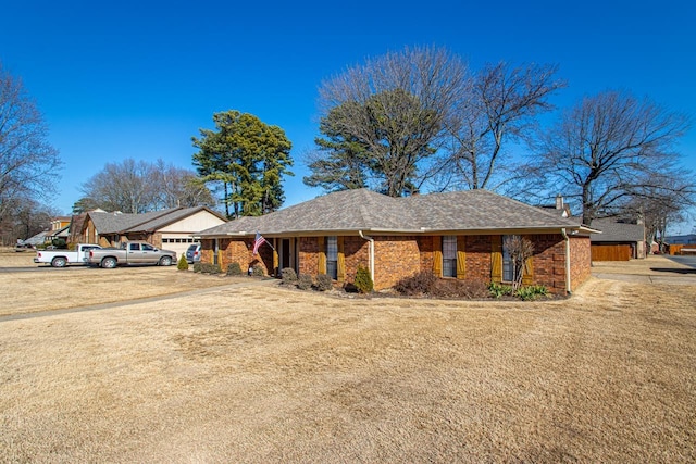 ranch-style home with a garage