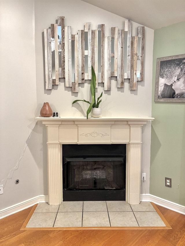 interior details featuring hardwood / wood-style floors