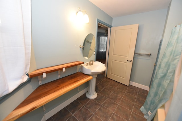 bathroom featuring tile patterned floors and sink