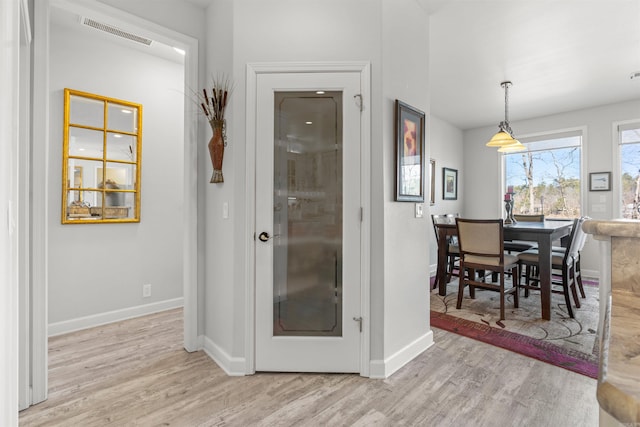 dining room with light hardwood / wood-style floors