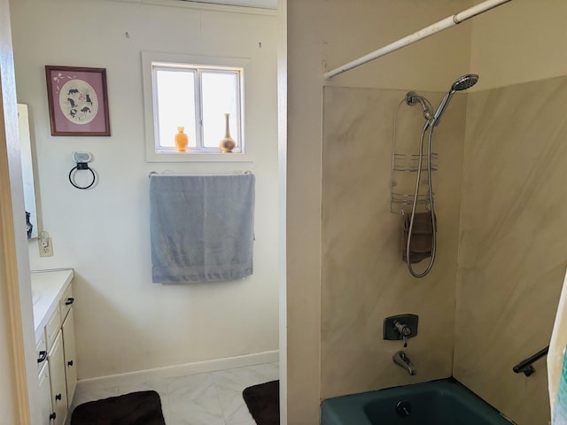 bathroom featuring bathing tub / shower combination and vanity