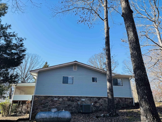 view of home's exterior featuring central AC