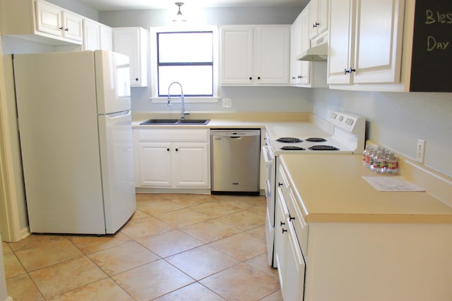 kitchen with white cabinetry, sink, light tile patterned flooring, and white appliances