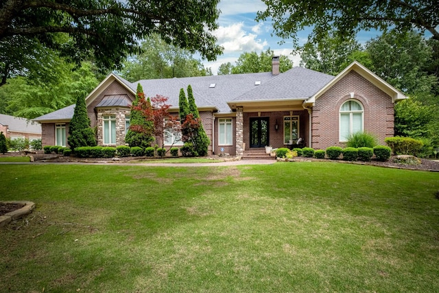 ranch-style house with a front yard