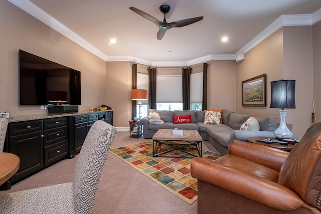 living room with light colored carpet, ornamental molding, and ceiling fan