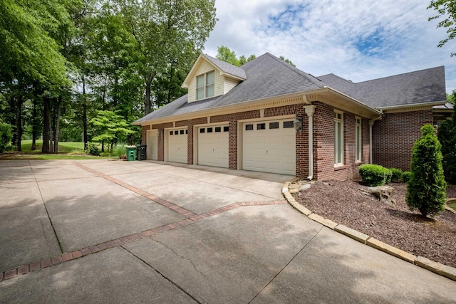 view of property exterior with a garage