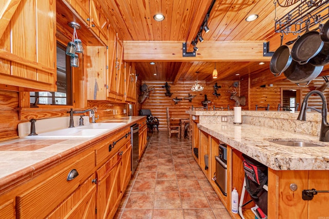 kitchen with log walls, dishwasher, sink, and wooden ceiling