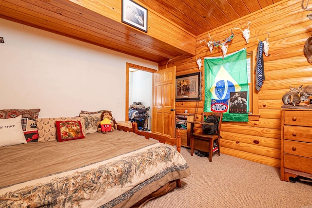 carpeted bedroom with wooden ceiling and rustic walls