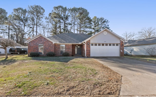 single story home with a garage and a front yard