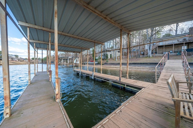 dock area with a water view