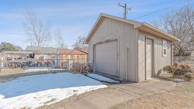 view of snow covered garage