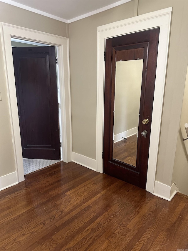 entrance foyer with dark hardwood / wood-style floors