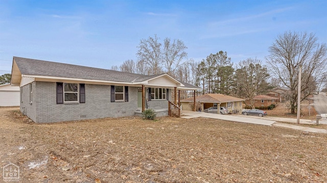 ranch-style house with covered porch