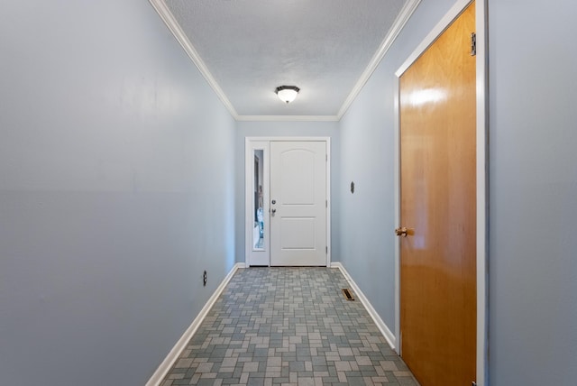 doorway to outside with ornamental molding