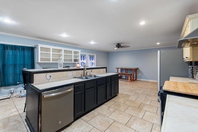 kitchen featuring stainless steel dishwasher, an island with sink, sink, and ornamental molding