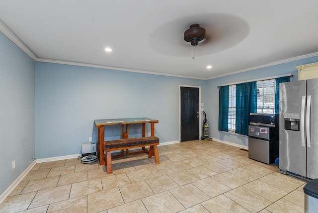 interior space with ceiling fan, ornamental molding, and stainless steel fridge