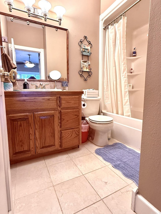 full bathroom featuring tile patterned flooring, vanity, shower / tub combo, and toilet