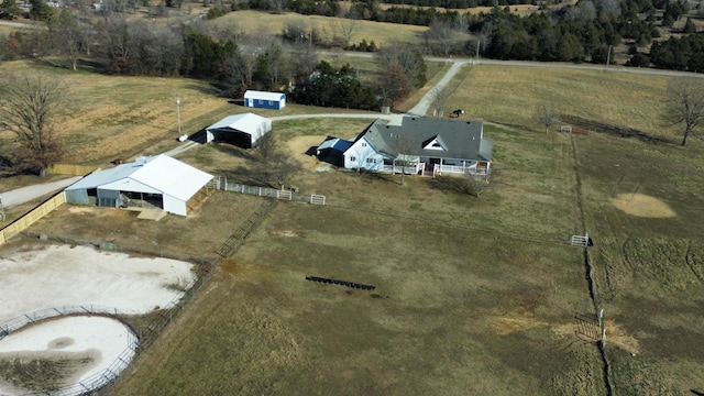 birds eye view of property featuring a rural view