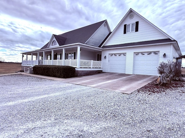 view of front of home featuring a garage and covered porch