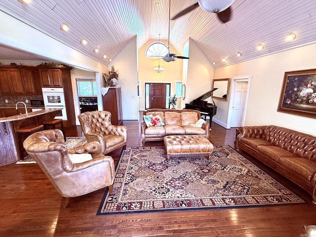 living room featuring high vaulted ceiling, dark hardwood / wood-style floors, sink, and wood ceiling