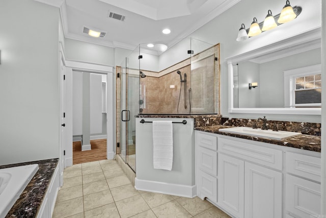 bathroom with an enclosed shower, crown molding, tile patterned floors, and vanity