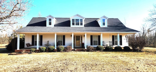 view of front facade featuring a porch and a front yard