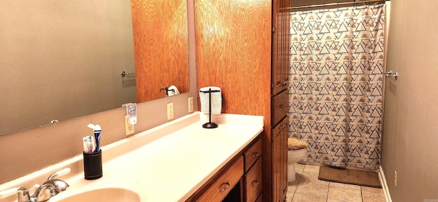 bathroom featuring tile patterned floors, vanity, toilet, and a shower with shower curtain