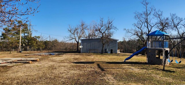 view of yard featuring a playground