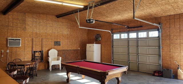 game room with pool table, a wall unit AC, and concrete floors