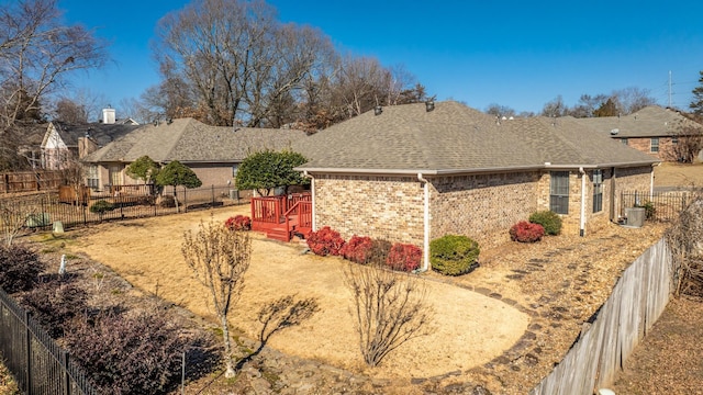 view of home's exterior featuring a deck