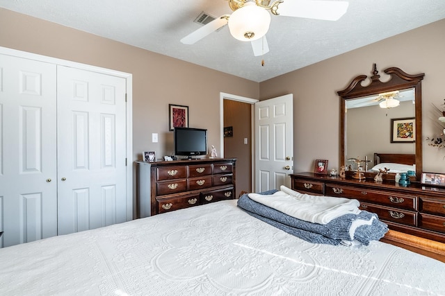 bedroom with a closet and ceiling fan