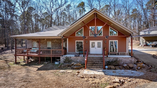 view of front of property featuring french doors and a porch