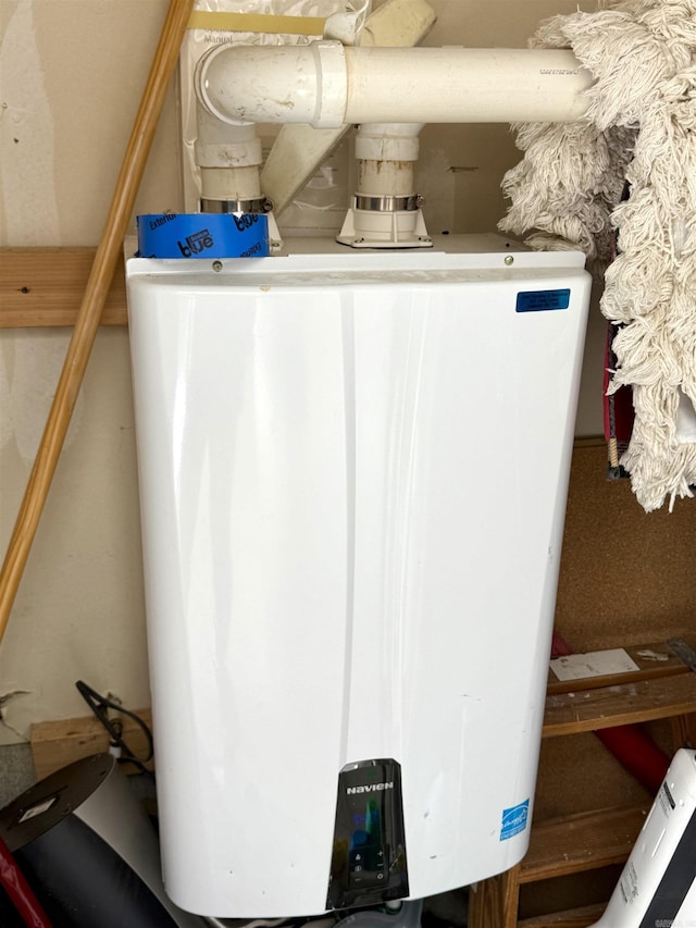 utility room with water heater