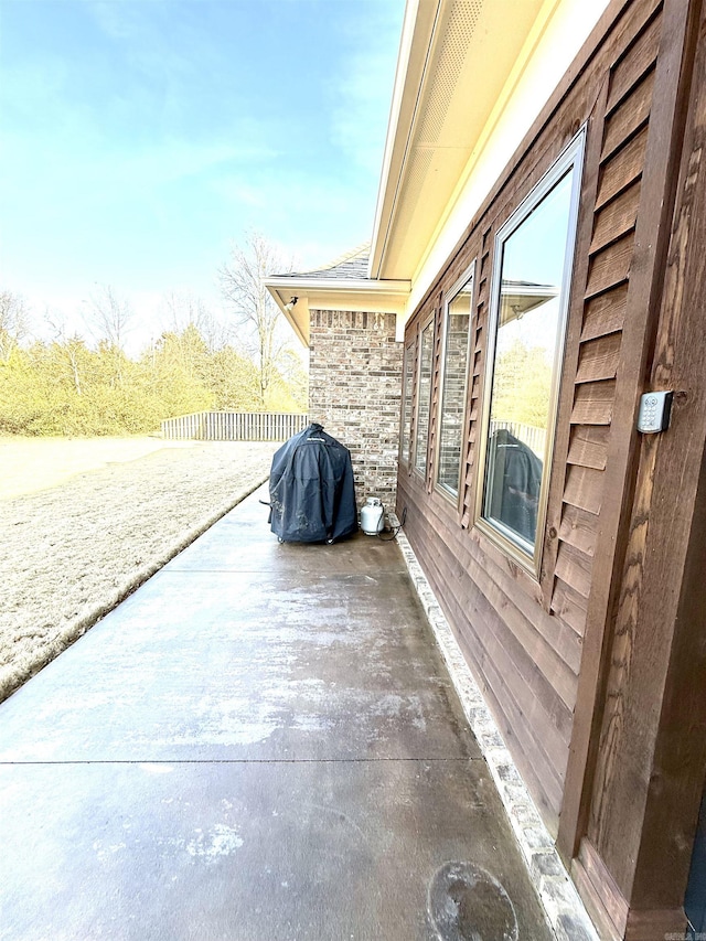 view of home's exterior featuring a patio area