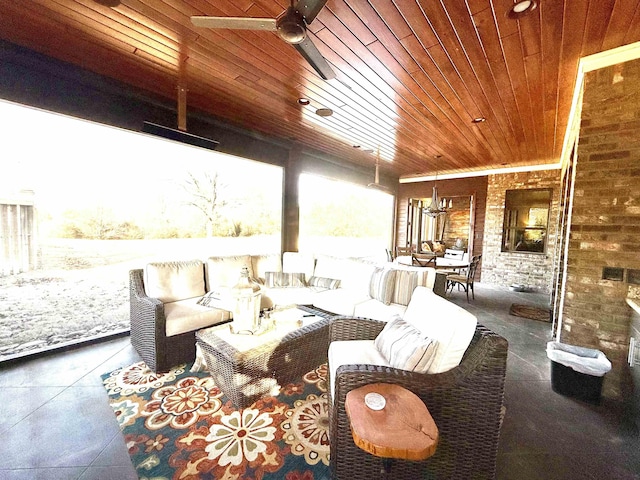 view of patio / terrace with an outdoor living space and ceiling fan