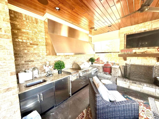 kitchen with brick wall, ventilation hood, sink, wood ceiling, and light stone countertops