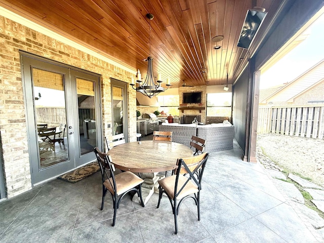 view of patio featuring an outdoor living space and french doors