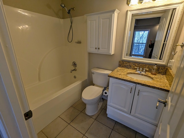 full bathroom featuring tile patterned flooring, vanity,  shower combination, and toilet