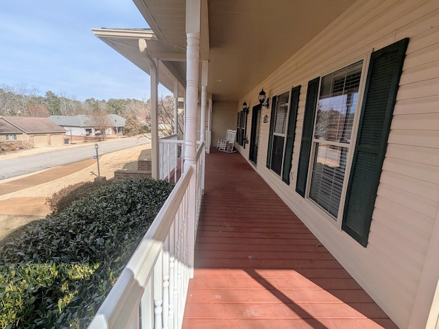 balcony featuring a porch