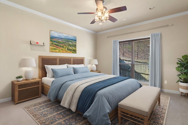 bedroom featuring ceiling fan, ornamental molding, and carpet flooring