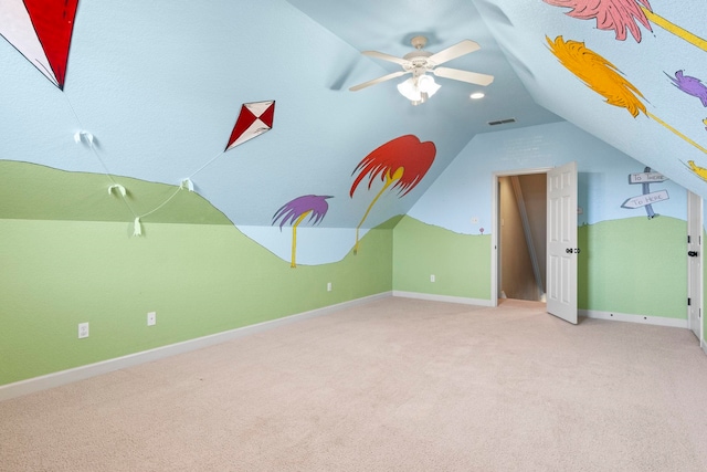 bonus room featuring lofted ceiling, light colored carpet, and ceiling fan